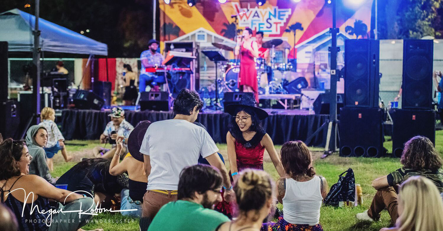 Audience enjoys the band on stage at WayneFest.
